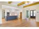 View of the kitchen island with marble countertop and sink, as seen from living room at 216 Meadow Walk Dr, Fuquay Varina, NC 27526