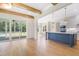 Open living space connects to kitchen and screened porch at 216 Meadow Walk Dr, Fuquay Varina, NC 27526