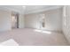 Bright and airy bedroom with adjacent ensuite bathroom at 216 Meadow Walk Dr, Fuquay Varina, NC 27526
