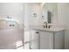 Stylish powder room with modern vanity, gold mirror, and view into bonus room at 216 Meadow Walk Dr, Fuquay Varina, NC 27526