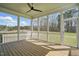 Relaxing screened-in porch with wood flooring provides a serene outdoor living space at 216 Meadow Walk Dr, Fuquay Varina, NC 27526