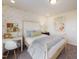 bedroom with butterfly wallpaper, twin bed, desk and natural light from one window at 231 Shingle Oak Rd, Wake Forest, NC 27587