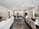 Open-concept design connects the kitchen, dining area, and living room for easy entertaining and Gathering time at 233 Shingle Oak Rd, Wake Forest, NC 27587