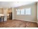 Open dining area adjacent to kitchen featuring hardwood floors and modern chandelier at 237 Abercorn Cir, Chapel Hill, NC 27516