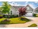 Charming home featuring a two-car garage, manicured lawn, and appealing curb appeal in a well-maintained neighborhood at 237 Abercorn Cir, Chapel Hill, NC 27516