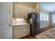 Kitchen featuring modern appliances, stainless steel refrigerator, and granite countertops at 237 Abercorn Cir, Chapel Hill, NC 27516