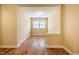 A spacious loft area with beautiful hardwood floors and light-filled window at 237 Abercorn Cir, Chapel Hill, NC 27516