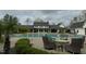 Inviting pool area with comfortable seating and a cozy fire pit, perfect for relaxation at 237 Abercorn Cir, Chapel Hill, NC 27516