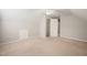 Neutral carpeted bedroom features a ceiling fan and a storage area at 2416 Boothbay Ct, Raleigh, NC 27613