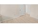 Bright bedroom with beautiful light hardwood floors and white trim at 2416 Boothbay Ct, Raleigh, NC 27613