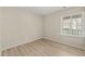 Bedroom featuring hardwood floors and a window to let in light at 2416 Boothbay Ct, Raleigh, NC 27613