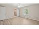 Bedroom features hardwood floors, a ceiling fan and ensuite bathroom at 2416 Boothbay Ct, Raleigh, NC 27613