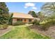 Charming single-story home with a well-maintained lawn, a cozy porch and mature landscaping at 2416 Boothbay Ct, Raleigh, NC 27613