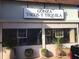 Gonza Tacos Y Tequila restaurant front with large sign and potted plants at 2416 Boothbay Ct, Raleigh, NC 27613