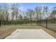 Outdoor patio area with black metal fence provides a private and peaceful retreat at 248 Shingle Oak Rd, Wake Forest, NC 27587