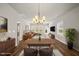 Open-concept living area with stylish furnishings, wood floors, and abundant natural light at 248 Shingle Oak Rd, Wake Forest, NC 27587