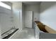 Modern bathroom featuring a stand-up shower, contemporary fixtures, and plenty of storage space at 249 Spilona Way # 64, Four Oaks, NC 27524