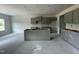 View of an unfinished kitchen with ample counter space and modern cabinetry at 249 Spilona Way # 64, Four Oaks, NC 27524