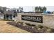 The Paddles Swim & Pickleball community pool sign, set against manicured landscaping, promotes an active and social lifestyle at 249 Wendover Pkwy, Pittsboro, NC 27312