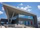 Architectural shot of a Ymca exterior showing modern design, steps, and a ramp at 249 Wendover Pkwy, Pittsboro, NC 27312