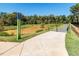 The Vineyards Greenway features a pond and paved walking path in Pittsboro at 249 Wendover Pkwy, Pittsboro, NC 27312