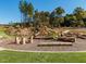The community playground has log seating and a small slide hill at 249 Wendover Pkwy, Pittsboro, NC 27312