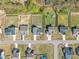 Aerial view showcasing backyards and the layout of homes within a quiet neighborhood setting at 274 Ashpole Trl, Clayton, NC 27520