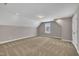 Finished attic space with neutral paint, carpet floors, recessed lighting and natural light at 274 Ashpole Trl, Clayton, NC 27520