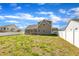 Exterior view of home displaying a lovely backyard, providing ample space for outdoor enjoyment at 274 Ashpole Trl, Clayton, NC 27520