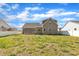 Exterior view highlighting the home's backyard, ideal for relaxation and entertainment at 274 Ashpole Trl, Clayton, NC 27520