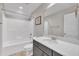 Bathroom featuring a bathtub with shower, toilet, modern vanity with mirror, and neutral paint at 274 Ashpole Trl, Clayton, NC 27520