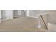 Spacious bonus room with staircase, carpet floors, neutral paint, and natural light at 274 Ashpole Trl, Clayton, NC 27520