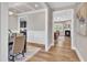 View of dining room with coffered ceilings and view into the living room with fireplace at 274 Ashpole Trl, Clayton, NC 27520