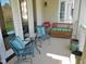 Cozy covered balcony with outdoor seating and grill, perfect for relaxing and entertaining at 2801 Glenwood Gardens Ln # 106, Raleigh, NC 27608
