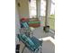 Relaxing outdoor space with comfortable seating, a small table, and a bench at 2801 Glenwood Gardens Ln # 106, Raleigh, NC 27608