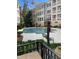 Inviting community pool surrounded by lush landscaping and comfortable seating areas at 2801 Glenwood Gardens Ln # 106, Raleigh, NC 27608