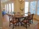 Bright dining area with a round table, wood chairs, and ample natural light at 2801 Glenwood Gardens Ln # 106, Raleigh, NC 27608