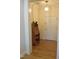 Bright foyer with hardwood floors, classic decor, and a view of the front door at 2801 Glenwood Gardens Ln # 106, Raleigh, NC 27608