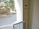 Well-lit stairwell with brick pavers and metal railings leading to the building entrance at 2801 Glenwood Gardens Ln # 106, Raleigh, NC 27608