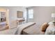 Bedroom featuring a decorative bed, side tables, and lamps at 296 Providence Creek Dr, Fuquay Varina, NC 27526