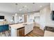 Spacious kitchen island with barstool seating and open to the living area at 296 Providence Creek Dr, Fuquay Varina, NC 27526