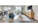 Inviting living area with a comfortable seating arrangement and scenic outdoor views at 296 Providence Creek Dr, Fuquay Varina, NC 27526