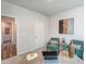 Well-lit office features hardwood floors, comfortable chairs, a modern desk, and neutral-toned walls at 296 Providence Creek Dr, Fuquay Varina, NC 27526