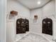 Well-organized walk-in closet with shelving and hanging storage at 296 Providence Creek Dr, Fuquay Varina, NC 27526