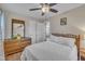 Comfortable bedroom with natural light and view to dresser at 3022 Dixon Rd, Durham, NC 27707