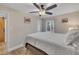 Bright bedroom with a ceiling fan, neutral tones, and a serene atmosphere at 3022 Dixon Rd, Durham, NC 27707