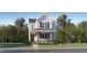 Charming two-story home with front porch and well-maintained landscaping in a desirable neighborhood at 316 Canyon Spring Trl, Wake Forest, NC 27587