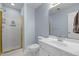 Bathroom showcasing a shower stall and sink at 317 Flatrock Ln, Holly Springs, NC 27540