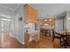 Well-designed kitchen area with desk, providing an efficient workspace adjacent to the dining nook at 317 Flatrock Ln, Holly Springs, NC 27540