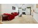 Spacious living room with fireplace, neutral carpet, and vaulted ceiling for a modern feel at 3213 Kirby St, Durham, NC 27713